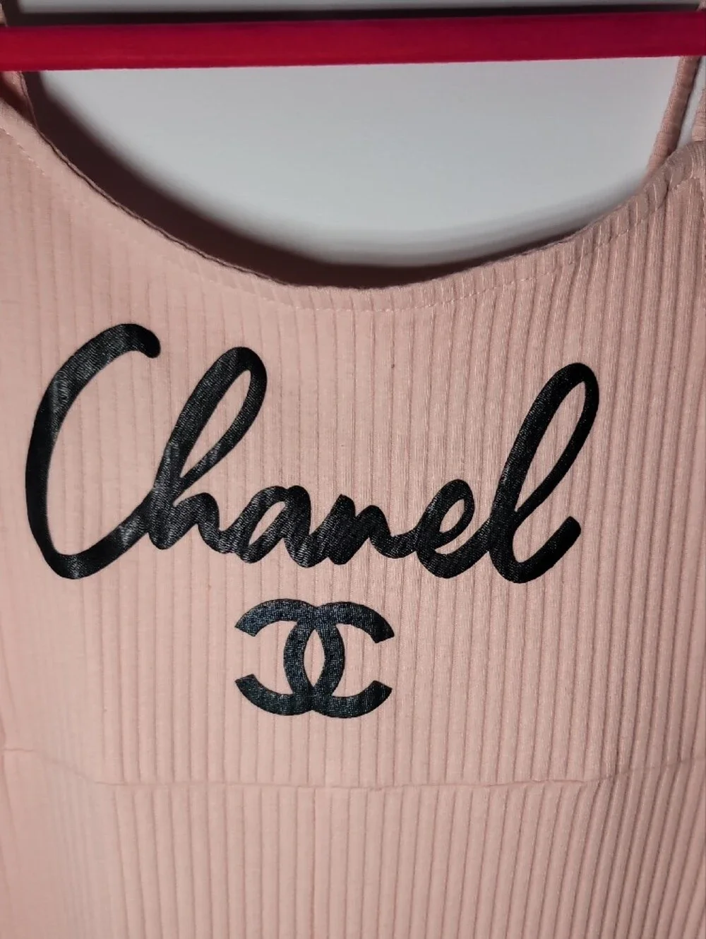 CHANEL Pale Pink Ribbed Tie-Strap Jumpsuit with Flared Hem